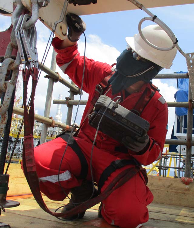 man conducting Eddy current test