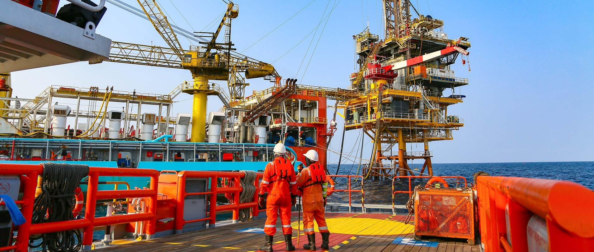 Consultants checking oil rig