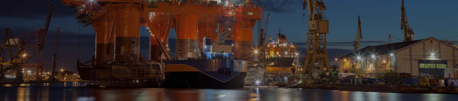 Ship docked at oil rig port